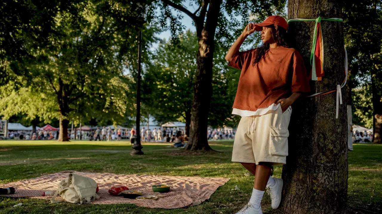 Young woman in oversized streetwear on city street